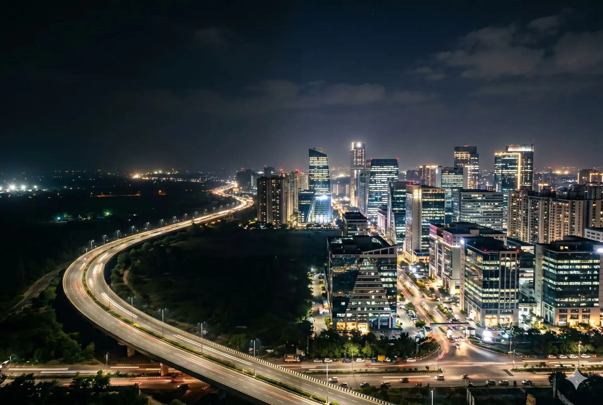 Gurugram skyline at night — luxury real estate corridors